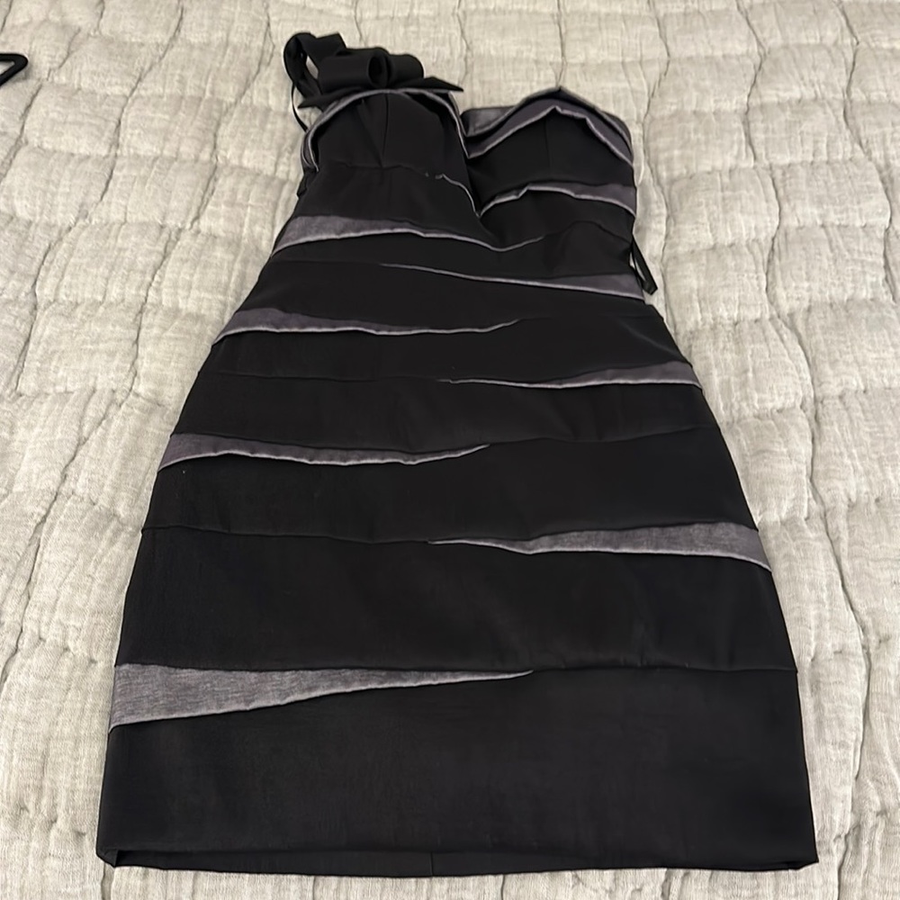 Betsy & Adam party dress! One shoulder, polyester with some spandex.